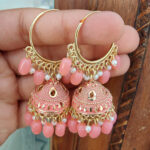 Jhumki is made of beautiful designer Meenakari using alloy and gold plated and decorated with Melon Pink coloured pearls.