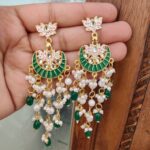 Lightweight meenakari and long pearl earrings made of alloy gold plated. From artificial stone and Green pearl