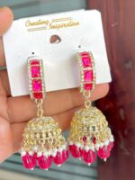 Saloni beautiful Carmine dark pink pendant earrings whose base metal is copper and plating is gold, with artificial stones and pearls.