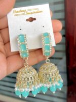 Saloni beautiful cyan Blue pendant earrings whose base metal is copper and plating is gold, with artificial stones and pearls.