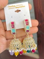 Saloni beautiful Multicolour pendant earrings whose base metal is copper and plating is gold, with artificial stones and pearls.