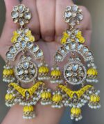 yellow Mehendi Polish Pachi Kundan Long Earrings having base metal alloy and gold plated with artificial Kundan stones and pearls, adjustable and made in India. which is held in hands and presented