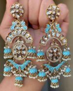 cool blue Mehendi Polish Pachi Kundan Long Earrings having base metal alloy and gold plated with artificial Kundan stones and pearls, adjustable and made in India. which is held in hands and presented